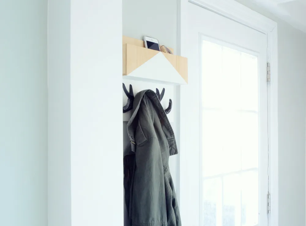 Gör-det-själv-projekt: en arrangör som hjälper till att stävja din entréskärare