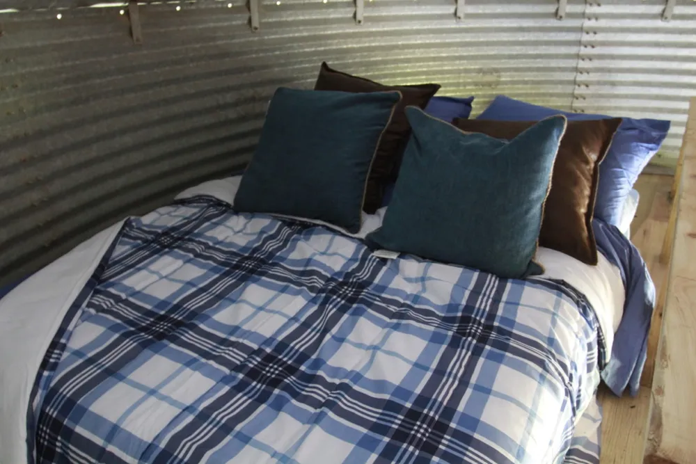 Casetta di caccia per la piccola casa del bidone del grano